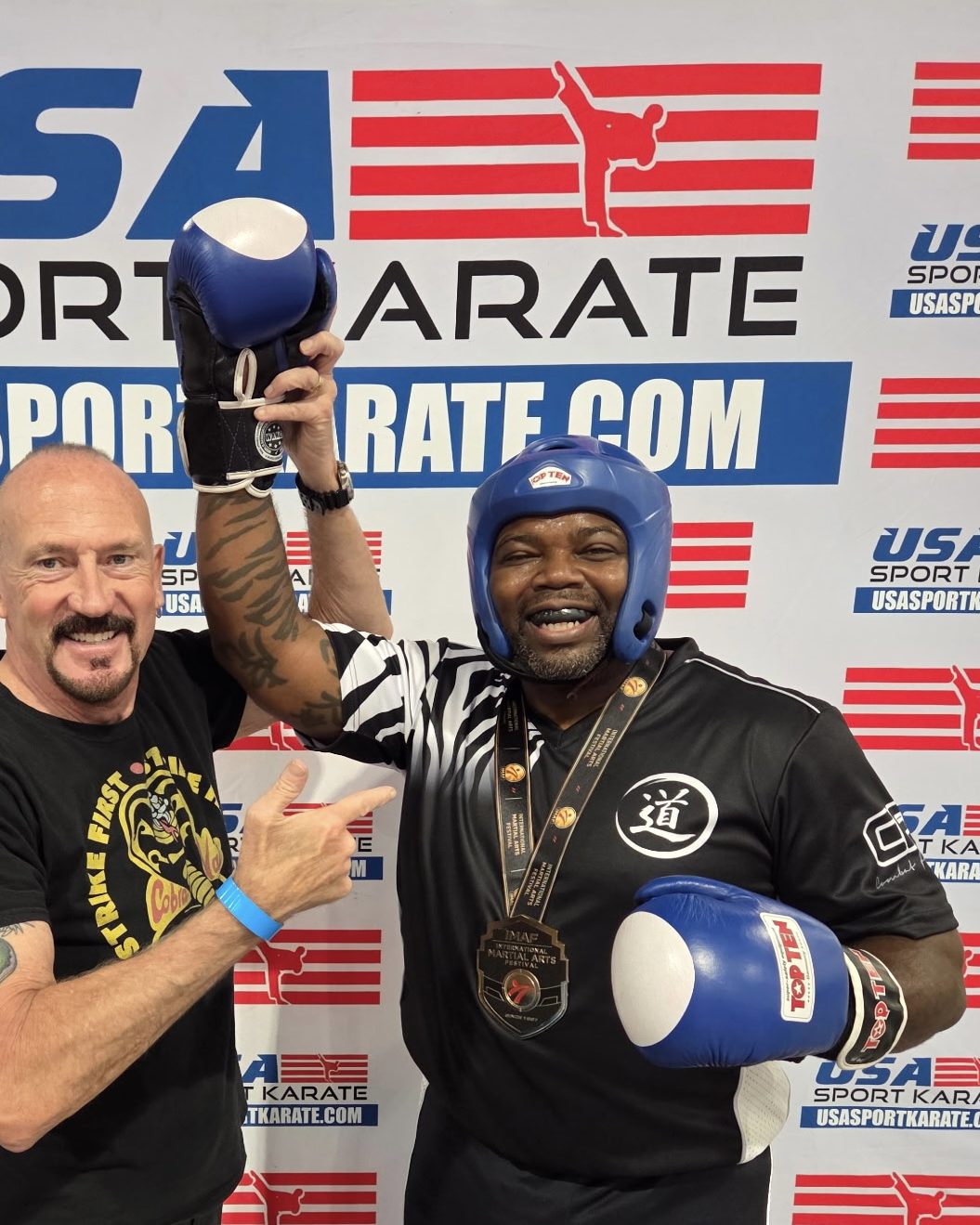 Instructor MJ with his medal at the 2026 USMAT Invitational