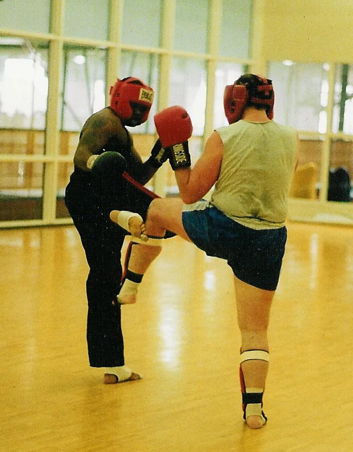 Instructor MJ in a kickboxing training session